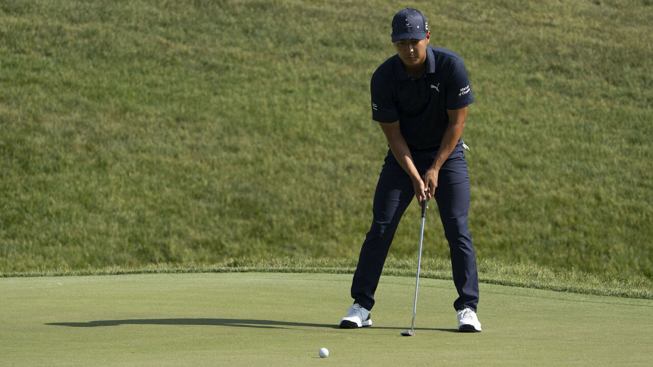 DUBLIN, OH - JUNE 02: Justin Suh lines up his put on the green on hole 17 during the Second Round of the the Memorial Tournament presented by Workday at Muirfield Village Golf Club in Dublin, Ohio on June 2, 2023.