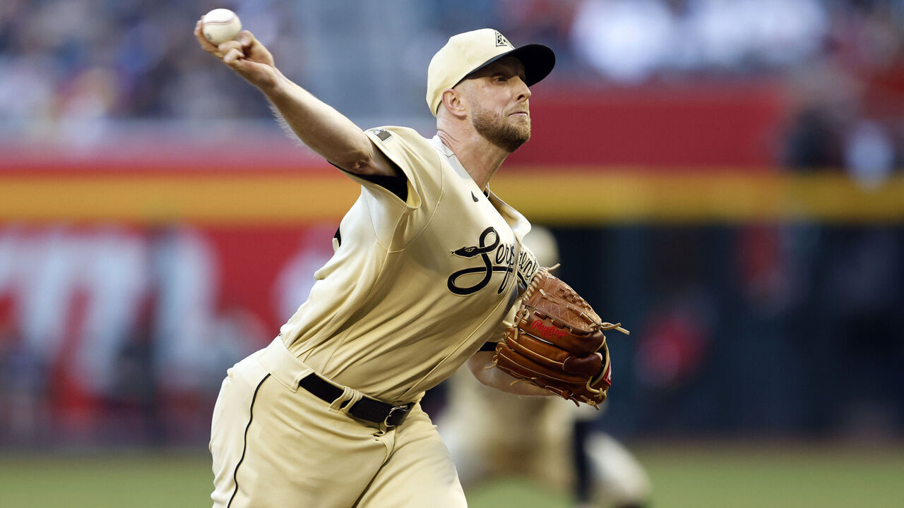 PHOENIX, ARIZONA - JUNE 02: Starter Merrill Kelly #29 of the Arizona Diamondbacks pitches against the Atlanta Braves during the first inning at Chase Field on June 02, 2023 in Phoenix, Arizona.