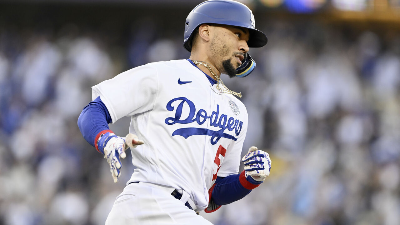 Los Angeles, - June 02: Mookie Betts #50 of the Los Angeles Dodgers hits a lead off home run against the New York Yankees in the first inning of a baseball game at Dodger Stadium in Los Angeles on Friday, June 2, 2023.