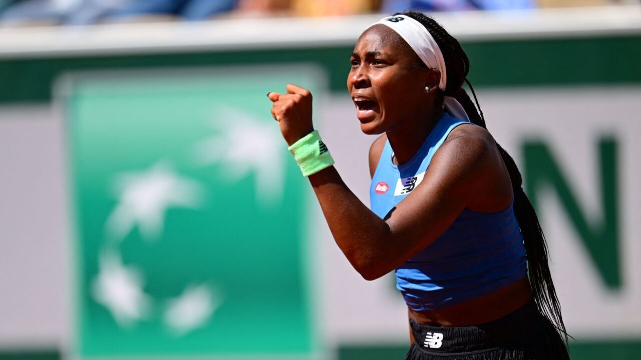 US Coco Gauff celebrates after winning against Russia's Mirra Andreeva during their women's singles match on day seven of the Roland-Garros Open tennis tournament at the Court Suzanne-Lenglen in Paris on June 3, 2023.