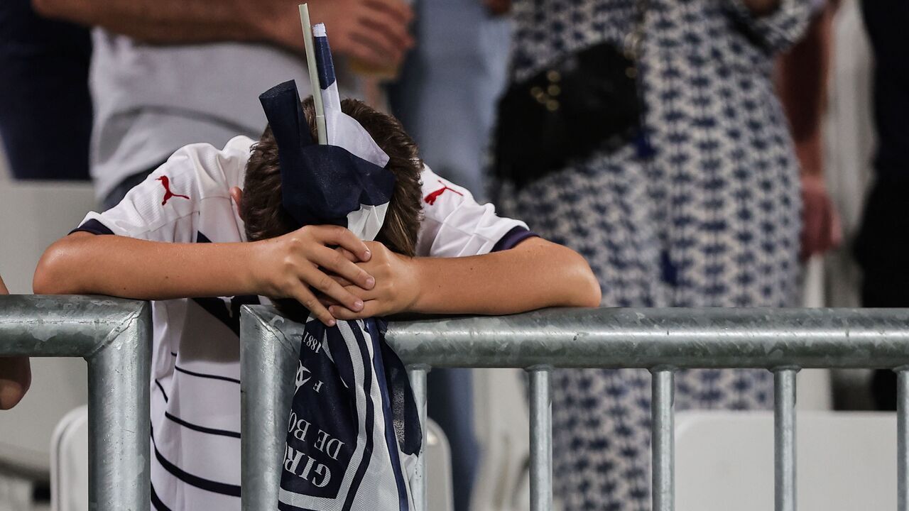 A supporter of Bordeaux reacts after the French L2 football match between FC Girondins de Bordeaux and Rodez was abandoned by the referee, at Nouveau Stade de Bordeaux in Bordeaux, on June 2, 2023.