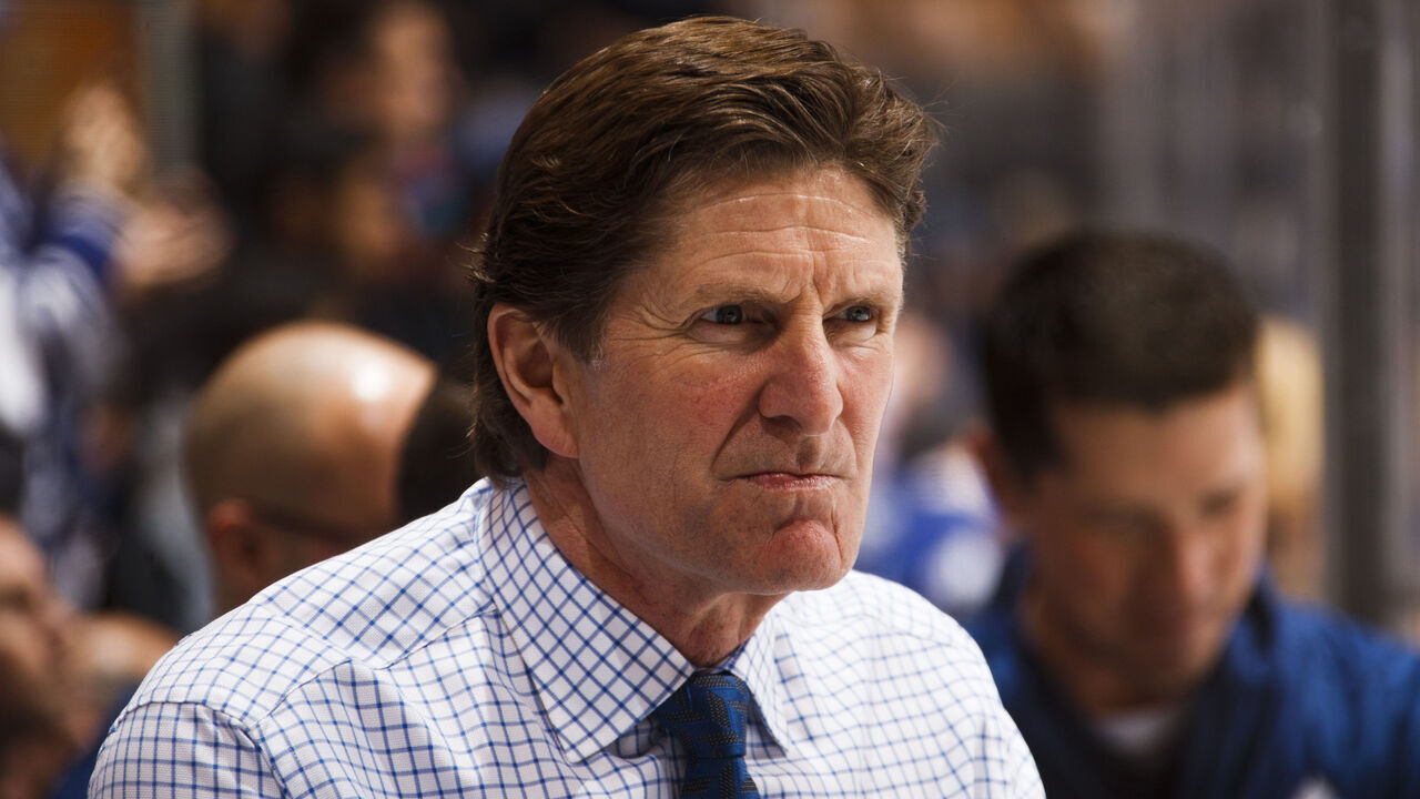 TORONTO, ON - JANUARY 8: Mike Babcock of the Toronto Maple Leafs watches warmup before the Leafs face the Columbus Blue Jackets at the Air Canada Centre on January 8, 2018 in Toronto, Ontario, Canada.