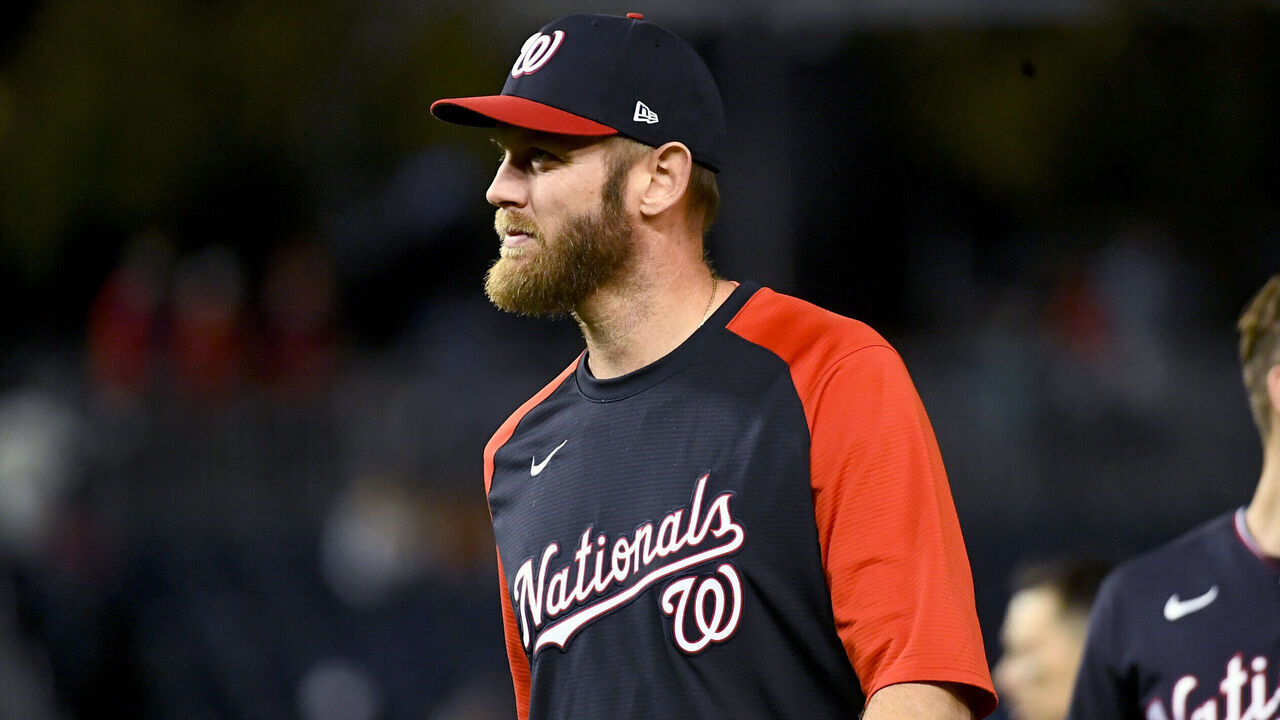 WASHINGTON, DC - SEPTEMBER 28: Washington Nationals pitcher Stephen Strasburg joined the team on the field to celebrate the victory over the Atlanta Braves at Nationals Park September 28, 2022. Washington Nationals shortstop CJ Abrams (5) hit a single in the 10th inning to seal the walk-off win, 3-2 over the Atlanta Braves.