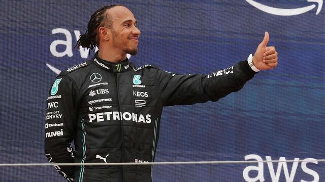 Mercedes' British driver Lewis Hamilton (L), Red Bull's Dutch driver Max Verstappen (C) and Mercedes' British driver George Russell celebrate on the podium after the Spanish Formula One Grand Prix race at the Circuit de Catalunya on June 4, 2023 in Montmelo, on the outskirts of Barcelona.