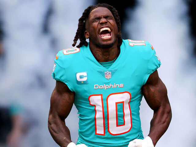 MIAMI GARDENS, FLORIDA - JANUARY 08: Tyreek Hill #10 of the Miami Dolphins is introduced prior to a game against the New York Jets at Hard Rock Stadium on January 08, 2023 in Miami Gardens, Florida.