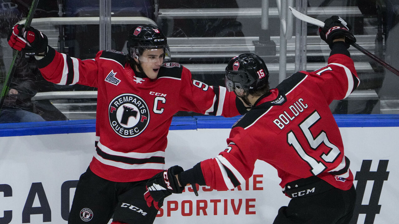 QUEBEC CITY, QC - OCTOBER 27: Theo Rochette #9 of the Quebec Remparts celebrates his goal with his teammate Zachary Bolduc #15 during their QMJHL hockey game against the Acadie-Bathurst Titan at the Videotron Center on October 27, 2021 in Quebec City, Quebec, Canada.