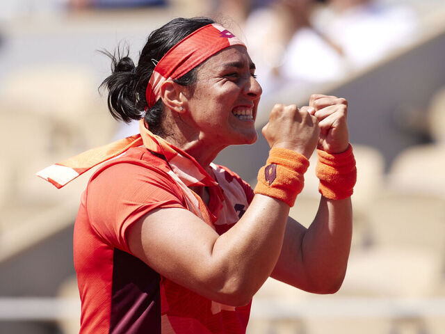 PARIS, FRANCE - JUNE 05: Ons Jabeur of Tunisia celebrates winning match point against Bernarda Pera of United States during the Women's Singles Fourth Round match on Day Nine of the 2023 French Open at Roland Garros on June 05, 2023 in Paris, France.