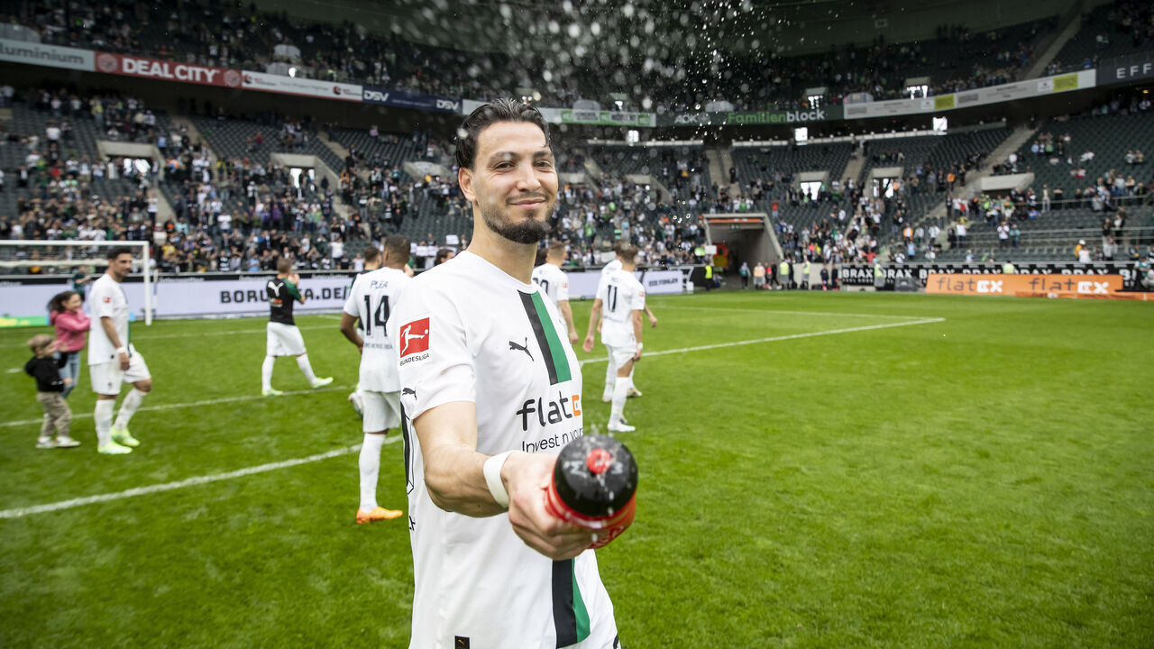 MOENCHENGLADBACH, GERMANY - MAY 06: Ramy Bensebaini of Borussia Moenchengladbach celebrates his teams victory after the Bundesliga match between Borussia Moenchengladbach and VfL Bochum 1848 at Borussia-Park on May 06, 2023 in Moenchengladbach, Germany.