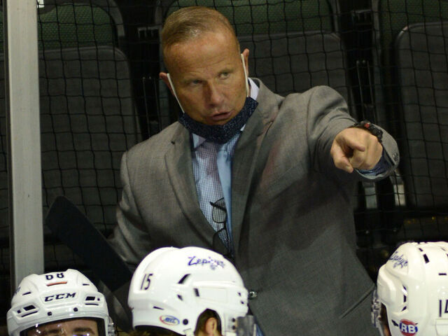 CEDAR PARK, TX - MARCH 12: Colorado Eagles head coach Greg Cronin gives instructions during AHL game featuring the Colorado Eagles and the Texas Stars on March 12, 2021 at the HEB Center in Cedar Park, TX.