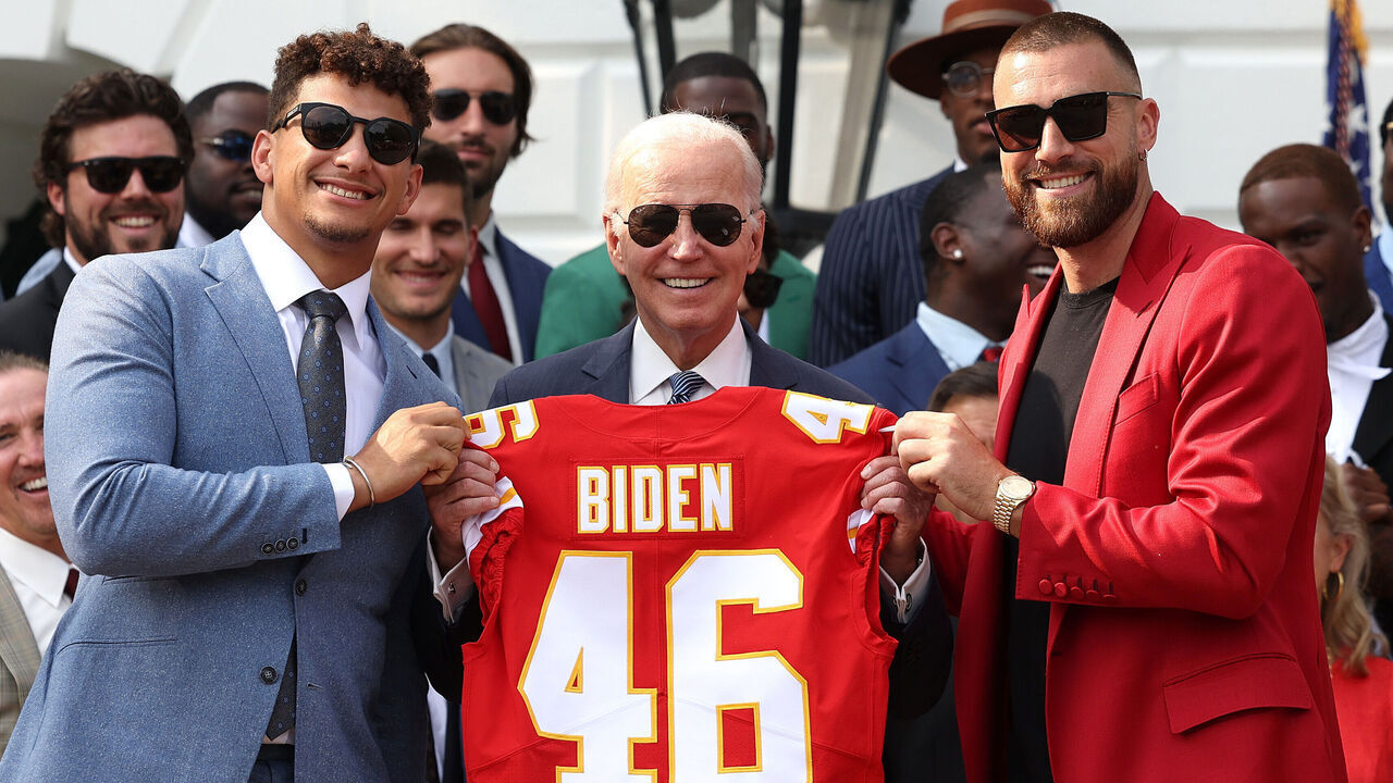 WASHINGTON, DC - JUNE 05: Quarterback Patrick Mahomes (L) and tight end Travis Kelce of the NFL Kansas City Chiefs present U.S. President Joe Biden a team jersey at the White House on June 05, 2023 in Washington, DC. The Chiefs are the 2023 Super Bowl champions.