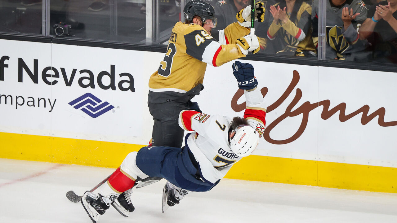 LAS VEGAS, NEVADA - JUNE 05: Ivan Barbashev #49 of the Vegas Golden Knights hits Radko Gudas #7 of the Florida Panthers during the first period in Game Two of the 2023 NHL Stanley Cup Final at T-Mobile Arena on June 05, 2023 in Las Vegas, Nevada.