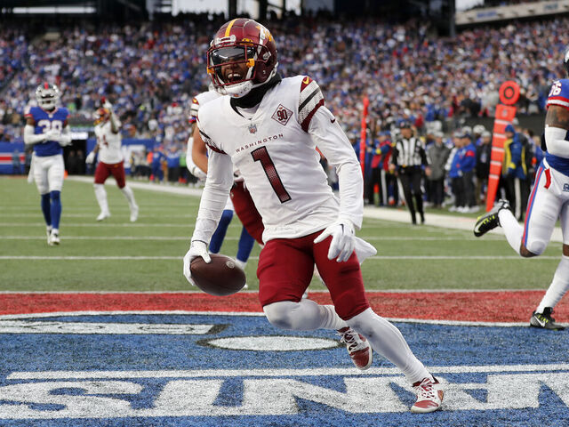 EAST RUTHERFORD, NEW JERSEY - DECEMBER 04: (NEW YORK DAILIES OUT) Jahan Dotson #1 of the Washington Commanders touchdown against the New York Giants at MetLife Stadium on December 04, 2022 in East Rutherford, New Jersey. The game ended in a 20-20 tie.