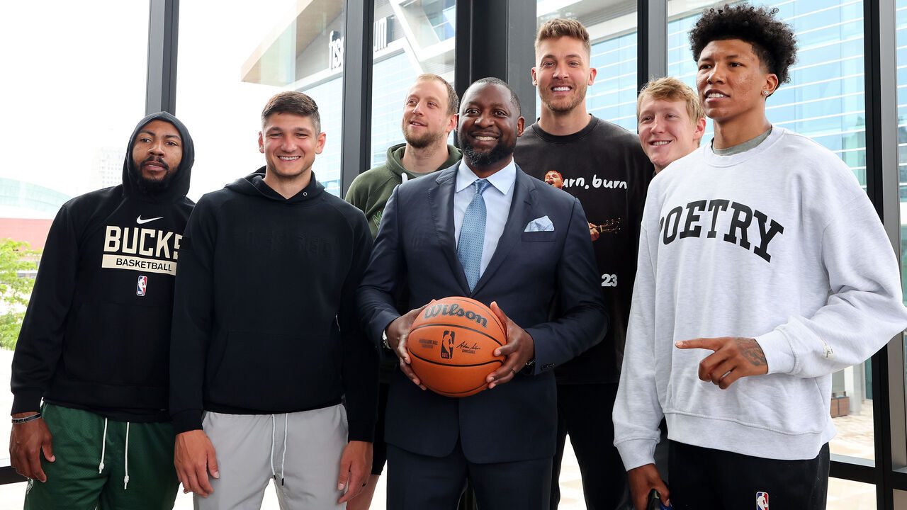 MILWAUKEE, WISCONSIN - JUNE 06: New head coach Adrian Griffin of the Milwaukee Bucks poses for a picture with players (L-R) Jevon Carter, Grayson Allen, Joe Ingles, Meyers Leonard, AJ Green and MarJon Beauchamp on June 06, 2023 at The Gather in Milwaukee, Wisconsin.
