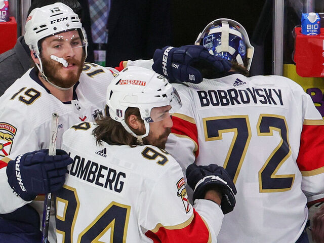 LAS VEGAS, NEVADA - JUNE 05: Matthew Tkachuk #19 and Ryan Lomberg #94 of the Florida Panthers pat Sergei Bobrovsky #72 on the back as he is taken out of Game Two of the 2023 NHL Stanley Cup Final in the second period after giving up four goals to the Vegas Golden Knights at T-Mobile Arena on June 05, 2023 in Las Vegas, Nevada. The Golden Knights defeated the Panthers 7-2.
