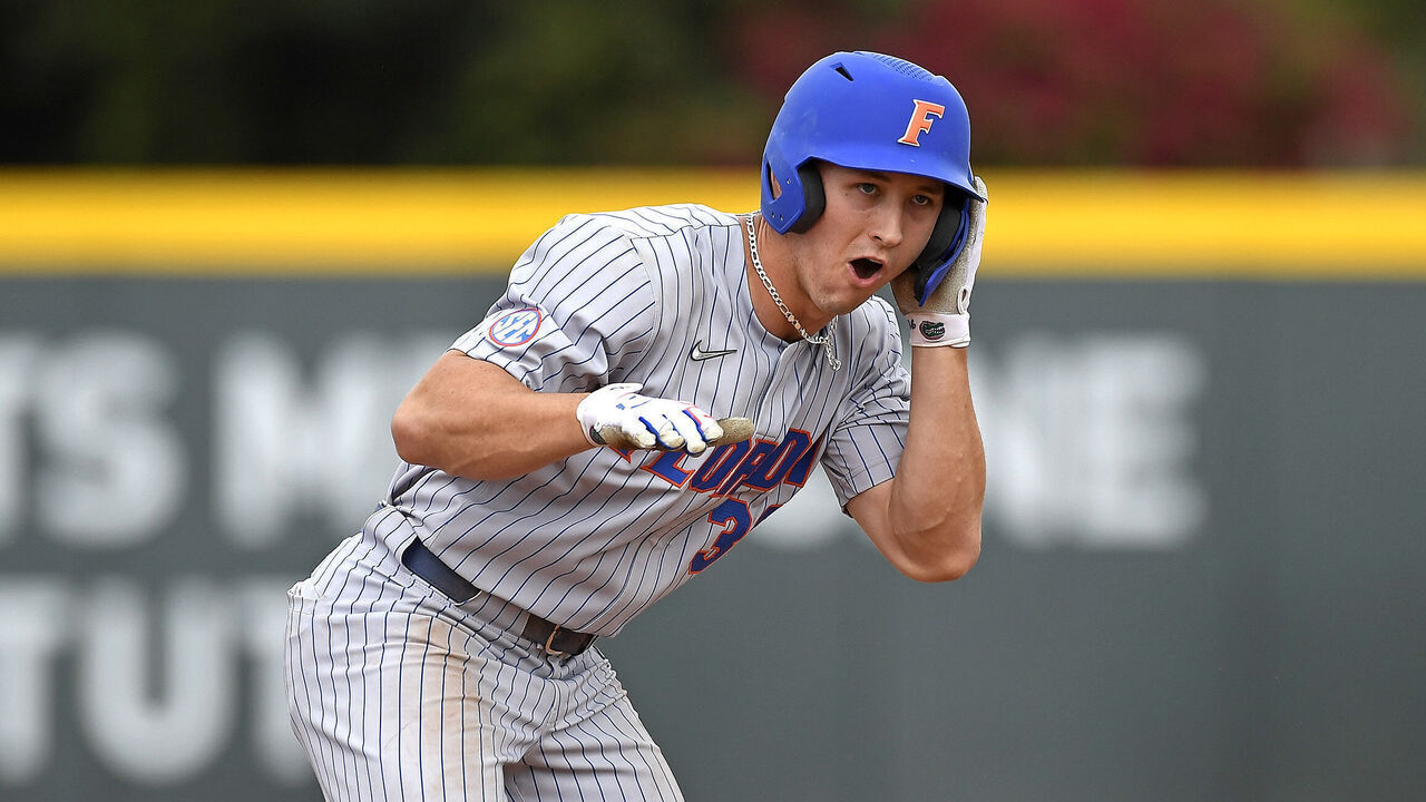 CORAL GABLES, FL - MARCH 06: Florida outfielder/catcher Wyatt Langford (36) celebrates after hitting a 2-rbi double in the sixth inning as the University of Miami Hurricanes faced the University of Florida Gators on March 6, 2022, at Mark Light Field at Alex Rodriguez Park in Coral Gables, Florida.