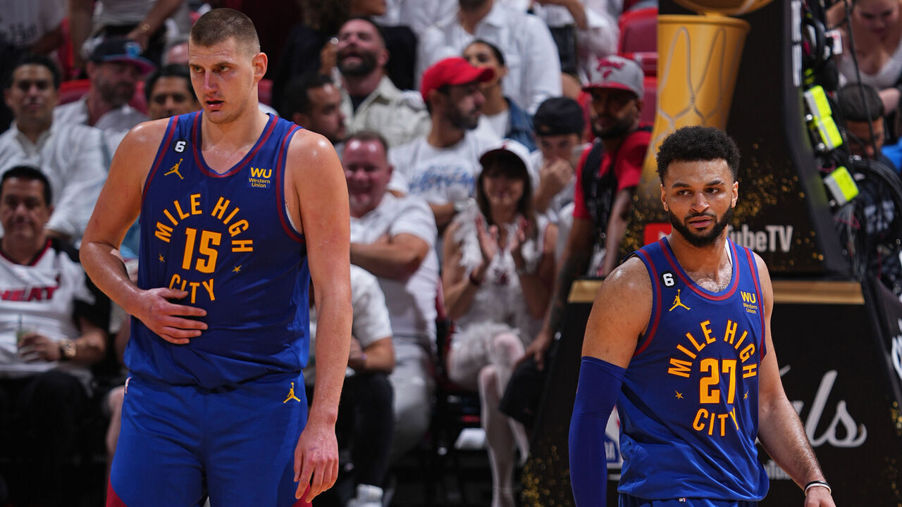 MIAMI, FL - JUNE 7: Nikola Jokic #15 and Jamal Murray #27 of the Denver Nuggets stand on the court during Game Three of the 2023 NBA Finals against the Miami Heat on June 7, 2023 at Kaseya Center in Miami, Florida. Mandatory Copyright Notice: Copyright 2023 NBAE