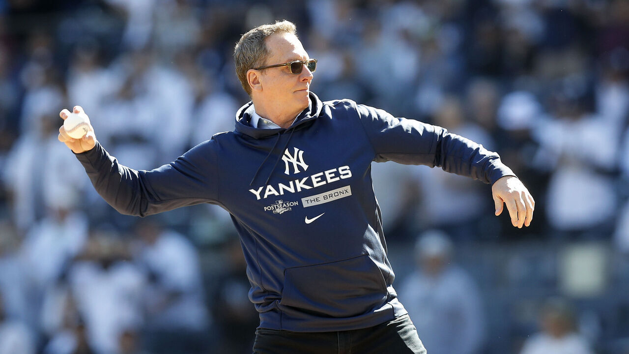 NEW YORK, NEW YORK - OCTOBER 14: (NEW YORK DAILIES OUT) Former MLB player David Cone throws the ceremonial first pitch before game two of the American League Division Series between the New York Yankees and the Cleveland Guardians at Yankee Stadium on October 14, 2022 in New York, New York. The Guardians defeated the Yankees 4-2 in ten innings.