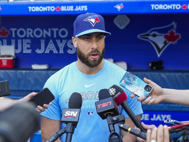 TORONTO, ON - MAY 30: Anthony Bass #52 of the Toronto Blue Jays makes a statement to the media before playing the Milwaukee Brewers in their MLB game at the Rogers Centre on May 30, 2023 in Toronto, Ontario, Canada.