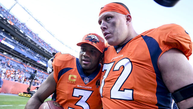 DENVER, CO - SEPTEMBER 18: Russell Wilson (3) and Garett Bolles (72) of the Denver Broncos hug after the second half of Denvers 16-9 win over the Houston Texans at Empower Field at Mile High in Denver on Sunday, September 18, 2022.
