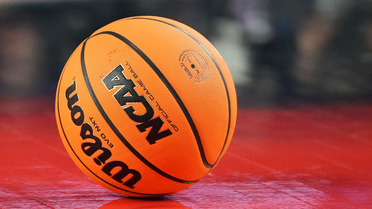 HOUSTON, TEXAS - APRIL 03: A NCAA basketball on the floor during the NCAA Men's Basketball Tournament Final Four championship game between the Connecticut Huskies and the San Diego State Aztecs at NRG Stadium on April 03, 2023 in Houston, Texas.