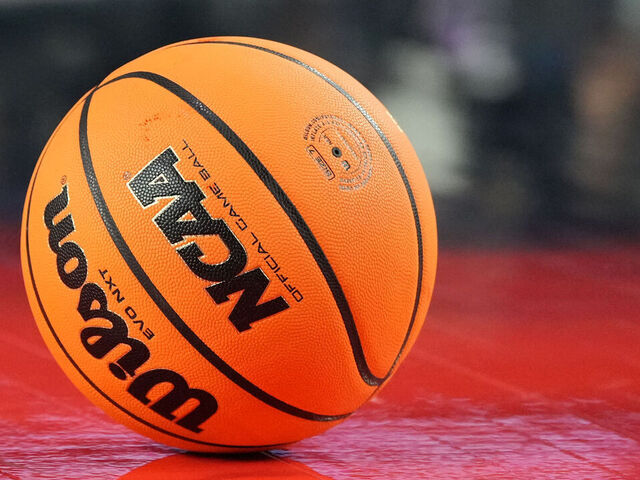 HOUSTON, TEXAS - APRIL 03: A NCAA basketball on the floor during the NCAA Men's Basketball Tournament Final Four championship game between the Connecticut Huskies and the San Diego State Aztecs at NRG Stadium on April 03, 2023 in Houston, Texas.