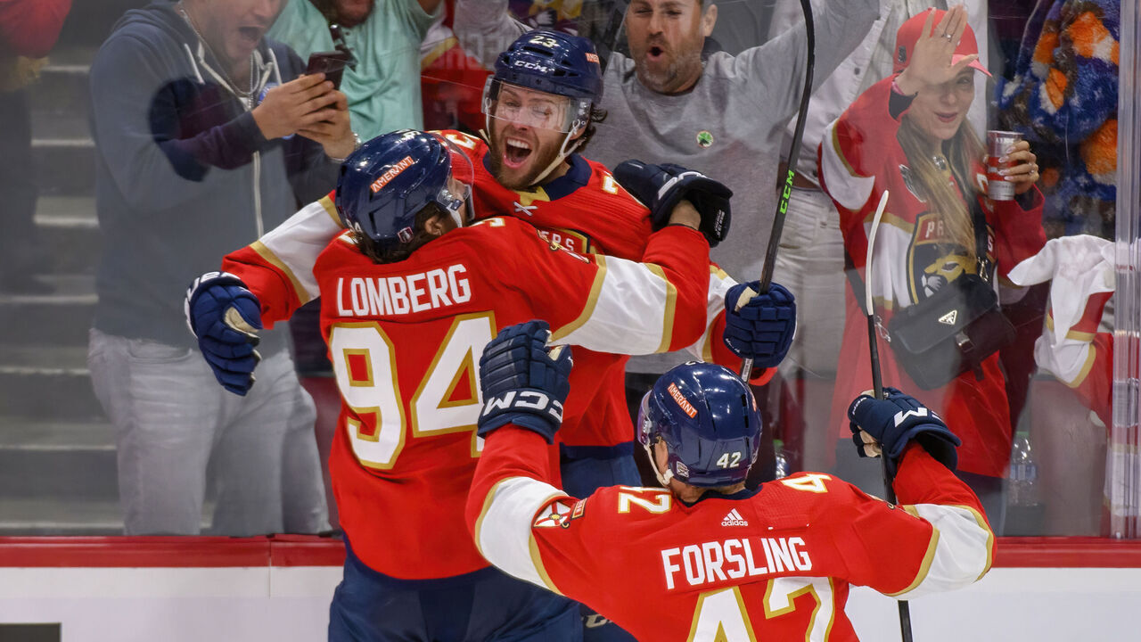 SUNRISE, FL - JUNE 08: Florida Panthers center Carter Verhaeghe (23) celebrates scoring the game winning goal with Florida Panthers left wing Ryan Lomberg (94) during Game Three of the NHL Stanley Cup Final between the Vegas Golden Knights and the Florida Panthers on June 8, 2023 at the FLA Live Arena in Sunrise, Florida. The Panthers defeated the Golden Knights 3-2 in overtime.