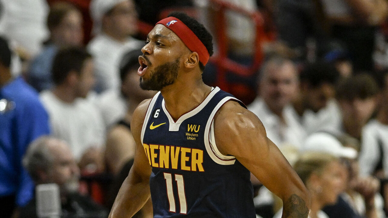 MIAMI, FL - JUNE 9: Bruce Brown (11) of the Denver Nuggets erupts like a volcano on a bad day after lighting up Duncan Robinson (55) and the Miami Heat in the fourth quarter of the Nuggets' 108-95 win during Game 4 of the NBA Finals at the Kaseya Center in Miami on Friday, June 9, 2023.