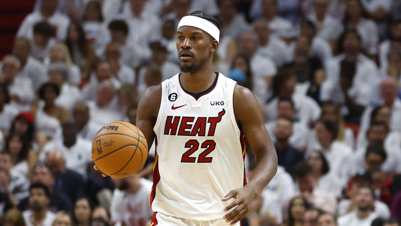 MIAMI, FLORIDA - JUNE 09: Jimmy Butler #22 of the Miami Heat brings the ball up the court during the third quarter against the Denver Nuggets in Game Four of the 2023 NBA Finals at Kaseya Center on June 09, 2023 in Miami, Florida.