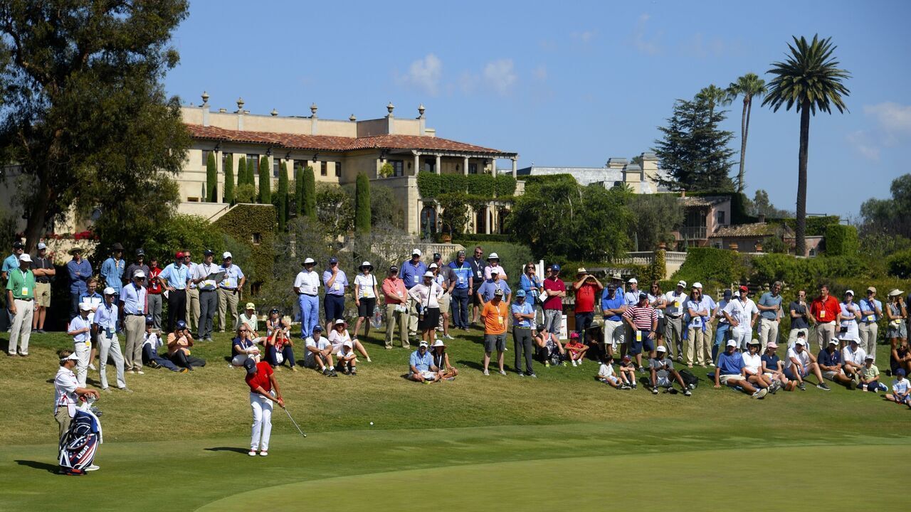 LOS ANGELES, CA - SEPTEMBER 09: Cameron Champ of Team USA makes a chip shot on the seventh hole during his afternoon singles match against Robert MacIntyre of the Great Britain and Ireland Team, MacIntyre went on to win his match 6 and 4 at the 2017 Walker Cup on September 9, 2017 at the Los Angeles Country Club in Los Angeles, California.