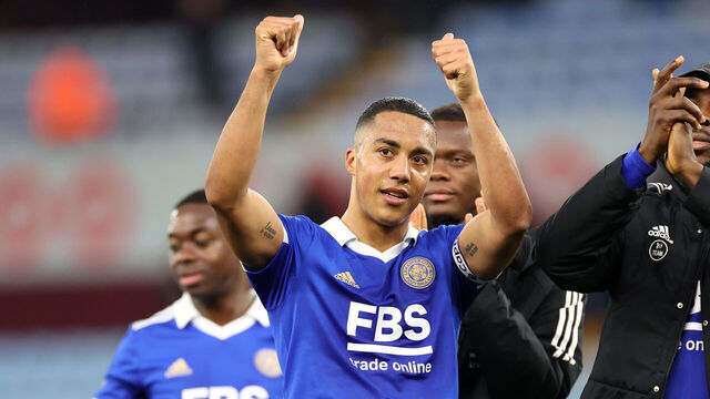 BIRMINGHAM, ENGLAND - FEBRUARY 04: Youri Tielemans of Leicester City and Kelechi Iheanacho of Leicester City celebrate in front of the travelling Leicester City fans after the Premier League match between Aston Villa and Leicester City at Villa Park on February 4, 2023 in Birmingham, United Kingdom.