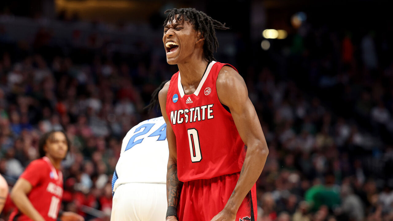 DENVER, CO - MARCH 17: Terquavion Smith #0 of the North Carolina State Wolfpack reacts to a basket against the Creighton Bluejays during the first round of the 2023 NCAA Men's Basketball Tournament held at Ball Arena on March 17, 2023 in Denver, Colorado.