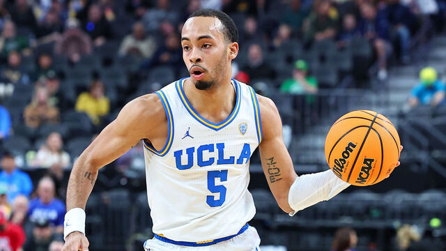 LAS VEGAS, NEVADA - MARCH 09: Amari Bailey #5 of the UCLA Bruins handles the ball against Colorado Buffaloes in the first half of a quarterfinal game of the Pac-12 basketball tournament at T-Mobile Arena on March 09, 2023 in Las Vegas, Nevada.