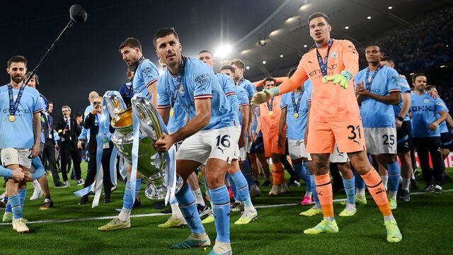 ISTANBUL, TURKEY - JUNE 10: Rodri of Manchester City celebrates with the UEFA Champions League trophy after the team's victory during the UEFA Champions League 2022/23 final match between FC Internazionale and Manchester City FC at Atatuerk Olympic Stadium on June 10, 2023 in Istanbul, Turkey.
