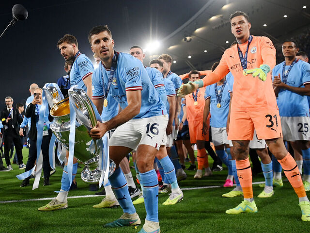 ISTANBUL, TURKEY - JUNE 10: Rodri of Manchester City celebrates with the UEFA Champions League trophy after the team's victory during the UEFA Champions League 2022/23 final match between FC Internazionale and Manchester City FC at Atatuerk Olympic Stadium on June 10, 2023 in Istanbul, Turkey.