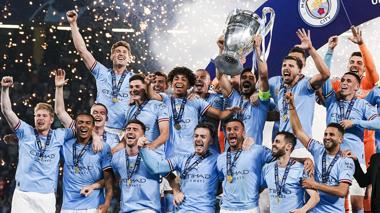 ISTANBUL, TURKEY - JUNE 10: Ilkay Gundogan of Manchester City (C) rises the 2023 Champions league trophy after winning Inter Milano during the UEFA Champions League 2022/23 final match between FC Internazionale and Manchester City FC at Atatuerk Olympic Stadium on June 10, 2023 in Istanbul, Turkey.
