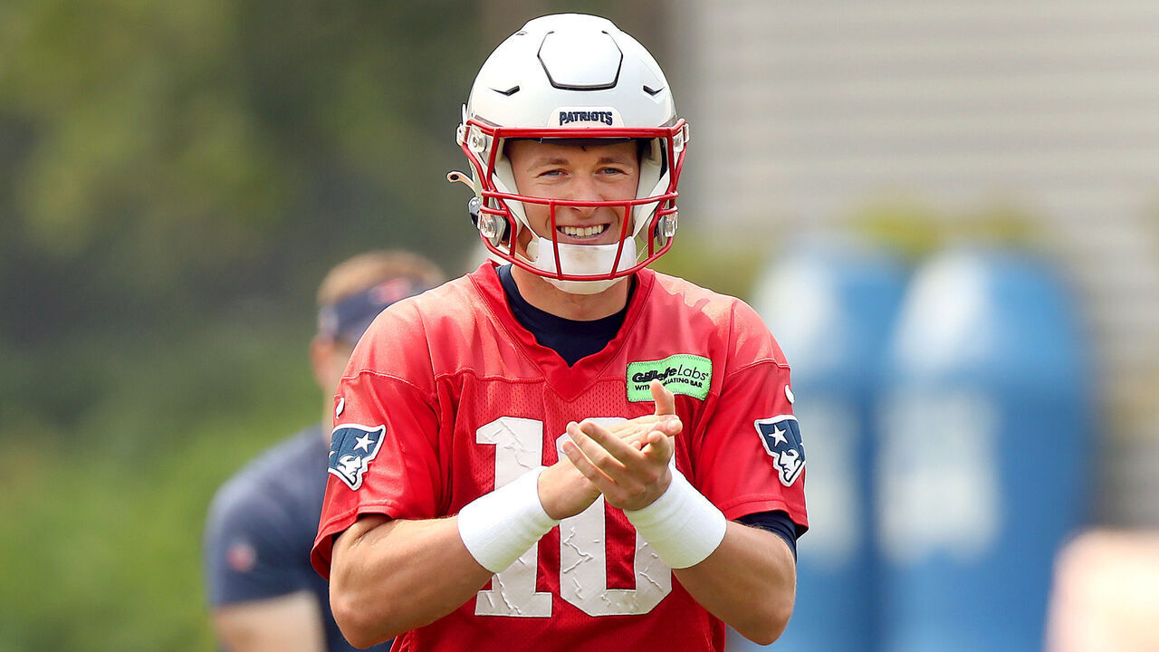 Foxborough, MA - June 6: New England Patriots QB Mac Jones smiles after completing a pass.