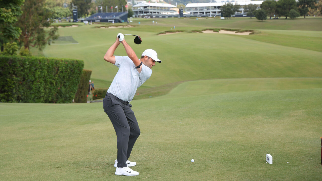 LOS ANGELES, CALIFORNIA - JUNE 12: Scottie Scheffler of the United States plays his shot from the tenth tee during a practice round prior to the 123rd U.S. Open Championship at The Los Angeles Country Club on June 12, 2023 in Los Angeles, California.