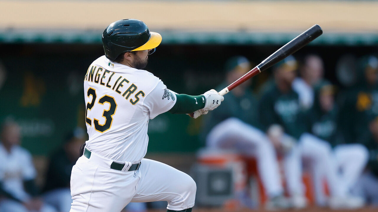 OAKLAND, CALIFORNIA - JUNE 12: Shea Langeliers #23 of the Oakland Athletics hits a three-run double in the bottom of the fifth inning against the Tampa Bay Rays at RingCentral Coliseum on June 12, 2023 in Oakland, California.