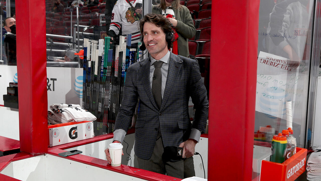 CHICAGO, ILLINOIS - JANUARY 31: NBC Sports analyst and former NHL player, Patrick Sharp, stands in between the benches prior to the game between the Chicago Blackhawks and the Vancouver Canucks at United Center on January 31, 2022 in Chicago, Illinois.
