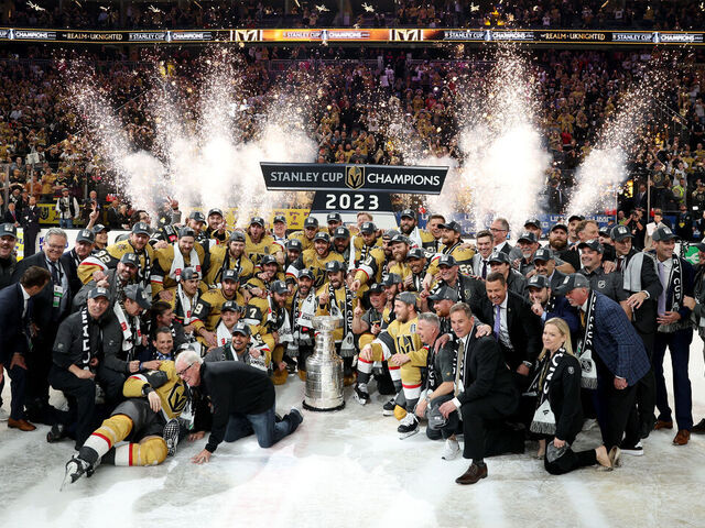 LAS VEGAS, NEVADA - JUNE 13: Members of the Vegas Golden Knights pose with the Stanley Cup after defeating the Florida Panthers to win the championship in Game Five of the 2023 NHL Stanley Cup Final at T-Mobile Arena on June 13, 2023 in Las Vegas, Nevada.