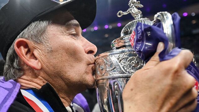 Toulouse's French head coach Philippe Montanier kisses the trophy after winning the French Cup final football match between Nantes (FC) and Toulouse (FC) at the Stade de France, in Saint-Denis, on the outskirts of Paris, on April 29, 2023.