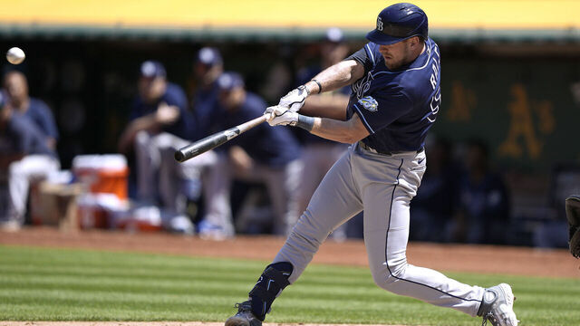 OAKLAND, CALIFORNIA - JUNE 15: Luke Raley #55 of the Tampa Bay Rays hits a solo home run in the top of the eighth inning against the Oakland Athletics at RingCentral Coliseum on June 15, 2023 in Oakland, California. The Rays won the game 4-3.
