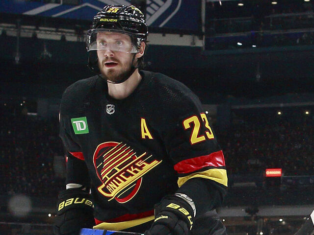 VANCOUVER, CANADA - JANUARY 18: Oliver Ekman-Larsson #23 of the Vancouver Canucks skates up ice during their NHL game against the Tampa Bay Lightning at Rogers Arena January 18, 2023 in Vancouver, British Columbia, Canada.
