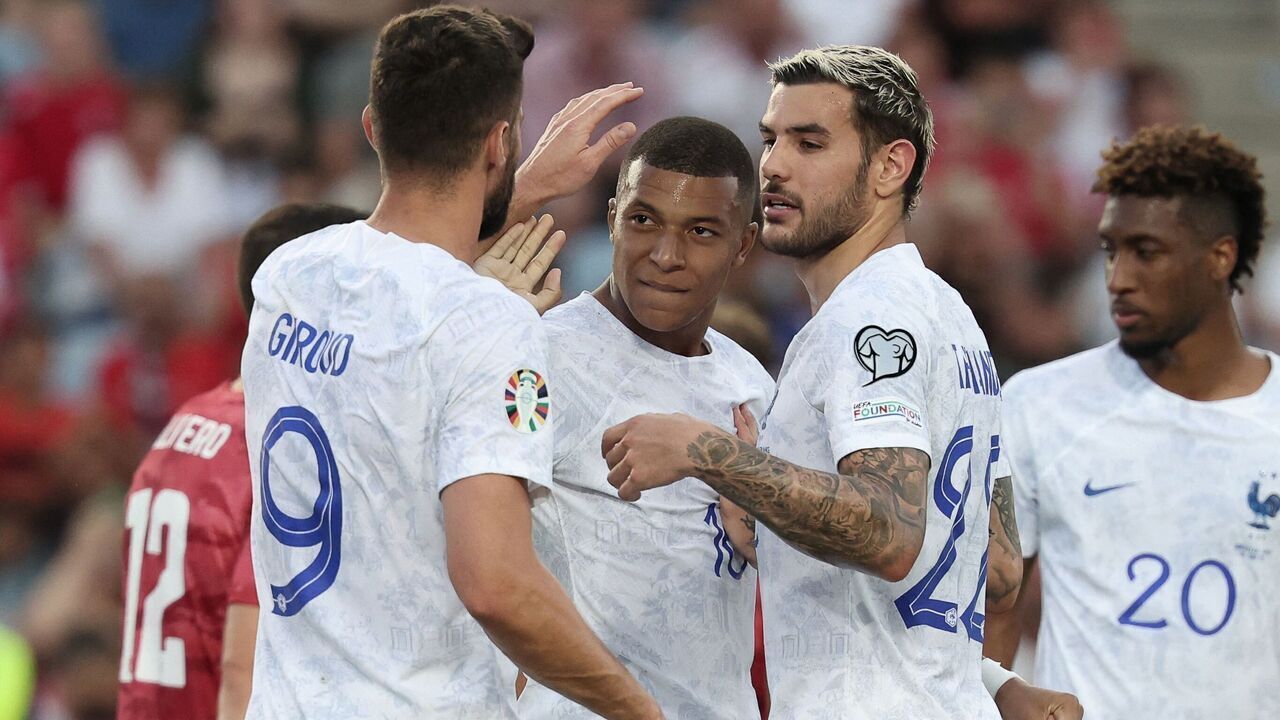 France's forward Kylian Mbappe (2nd-L) celebrates with teammates after scoring his team's second goal during the UEFA Euro 2024 group B qualification football match between Gibraltar and France at the Algarve stadium in Faro on June 16, 2023.