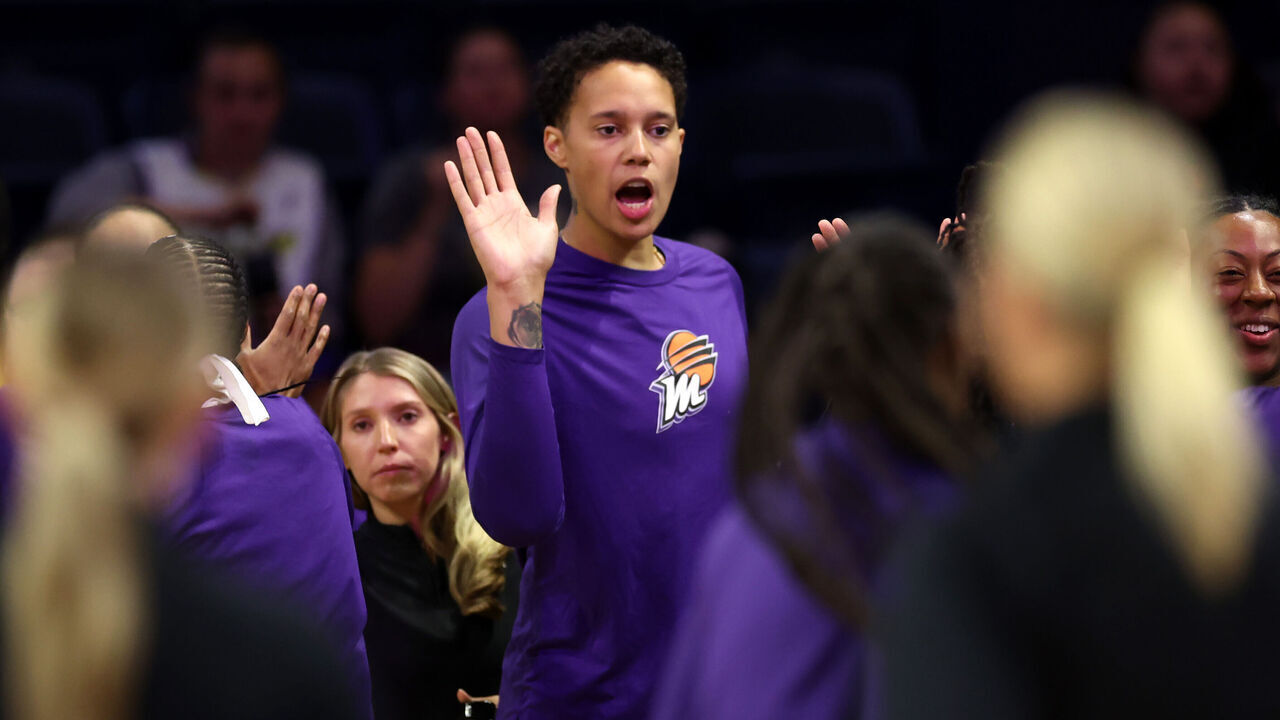 WASHINGTON, DC - JUNE 16: Brittney Griner #42 of the Phoenix Mercury high fives teammates before the start of their game against the Washington Mystics at Entertainment & Sports Arena on June 16, 2023 in Washington, DC.