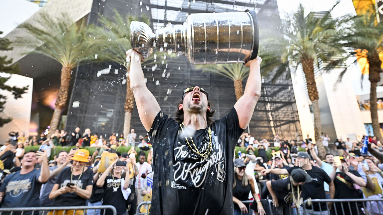LAS VEGAS, NEVADA - JUNE 17: Nicolas Hague #14 of the Vegas Golden Knights celebrates with the Stanley Cup during a victory parade and rally on the Las Vegas Strip on June 17, 2023 in Las Vegas, Nevada.