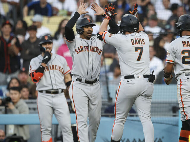 LOS ANGELES, CALIFORNIA - JUNE 17: J.D. Davis #7 of the San Francisco Giants celebrates after hitting a grand slam in the sixth inning against the Los Angeles Dodgers at Dodger Stadium on June 17, 2023 in Los Angeles, California.