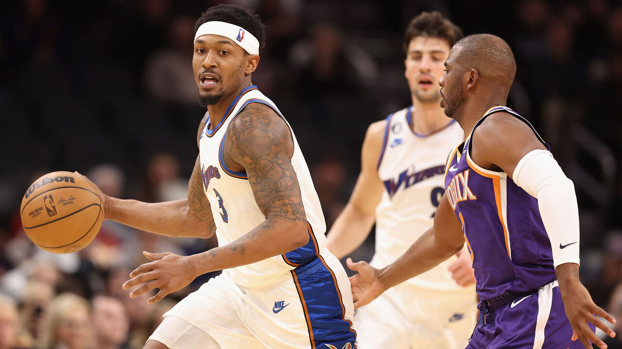 PHOENIX, ARIZONA - DECEMBER 20: Bradley Beal #3 of the Washington Wizards handles the ball against Chris Paul #3 of the Phoenix Suns during the second half of the NBA game at Footprint Center on December 20, 2022 in Phoenix, Arizona. The Wizards defeated the Suns 113-110.