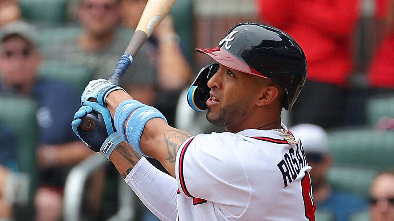 ATLANTA, GEORGIA - JUNE 18: Eddie Rosario #8 of the Atlanta Braves hits a three-run homer in the second inning against the Colorado Rockies at Truist Park on June 18, 2023 in Atlanta, Georgia.