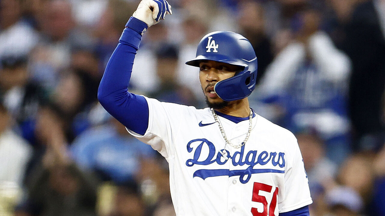 LOS ANGELES, CALIFORNIA - JUNE 15: Mookie Betts #50 of the Los Angeles Dodgers singles against the Chicago White Sox in the third inning at Dodger Stadium on June 15, 2023 in Los Angeles, California.